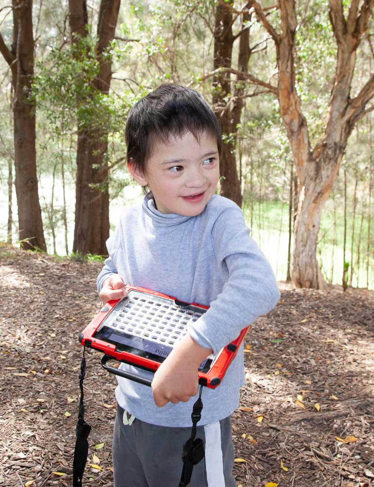 Young Noah has been learning to use a communication device with support from Northcott