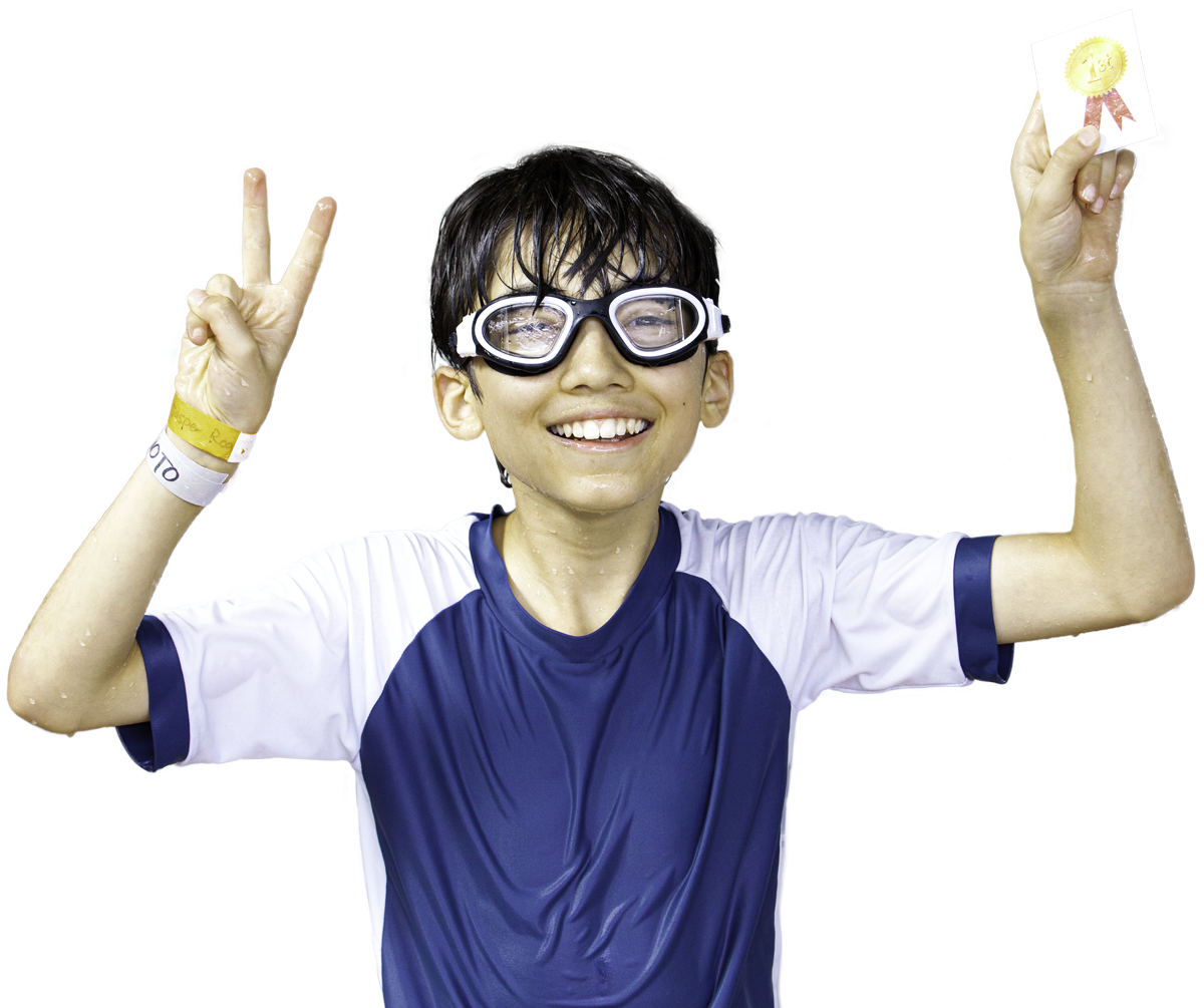 A primary school boy celebrating his win at Northcott's Swimming Carnival